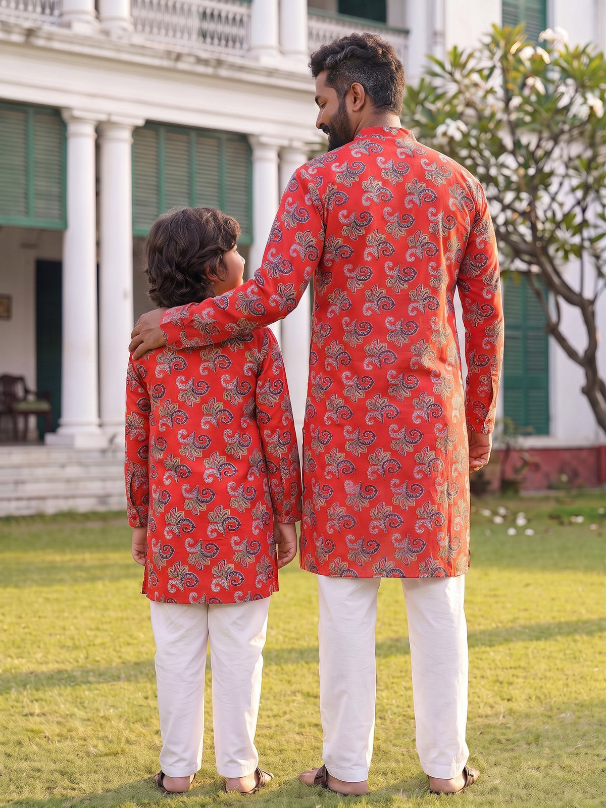 Back view of bold red floral kurtas