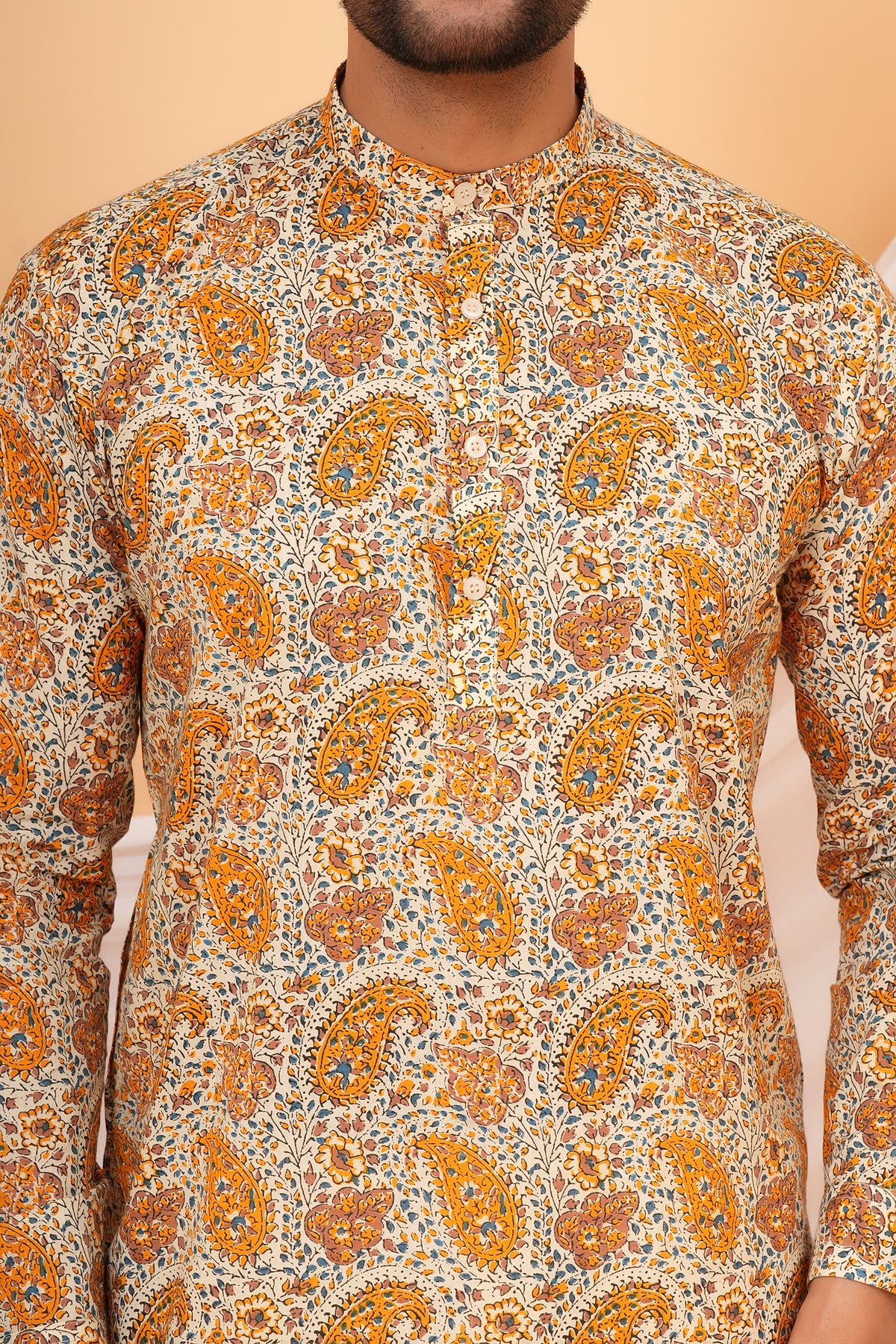 Paisley Printed Kalamkari Cotton Kurti with Mandarin Collar for Beti - Mustard Yellow