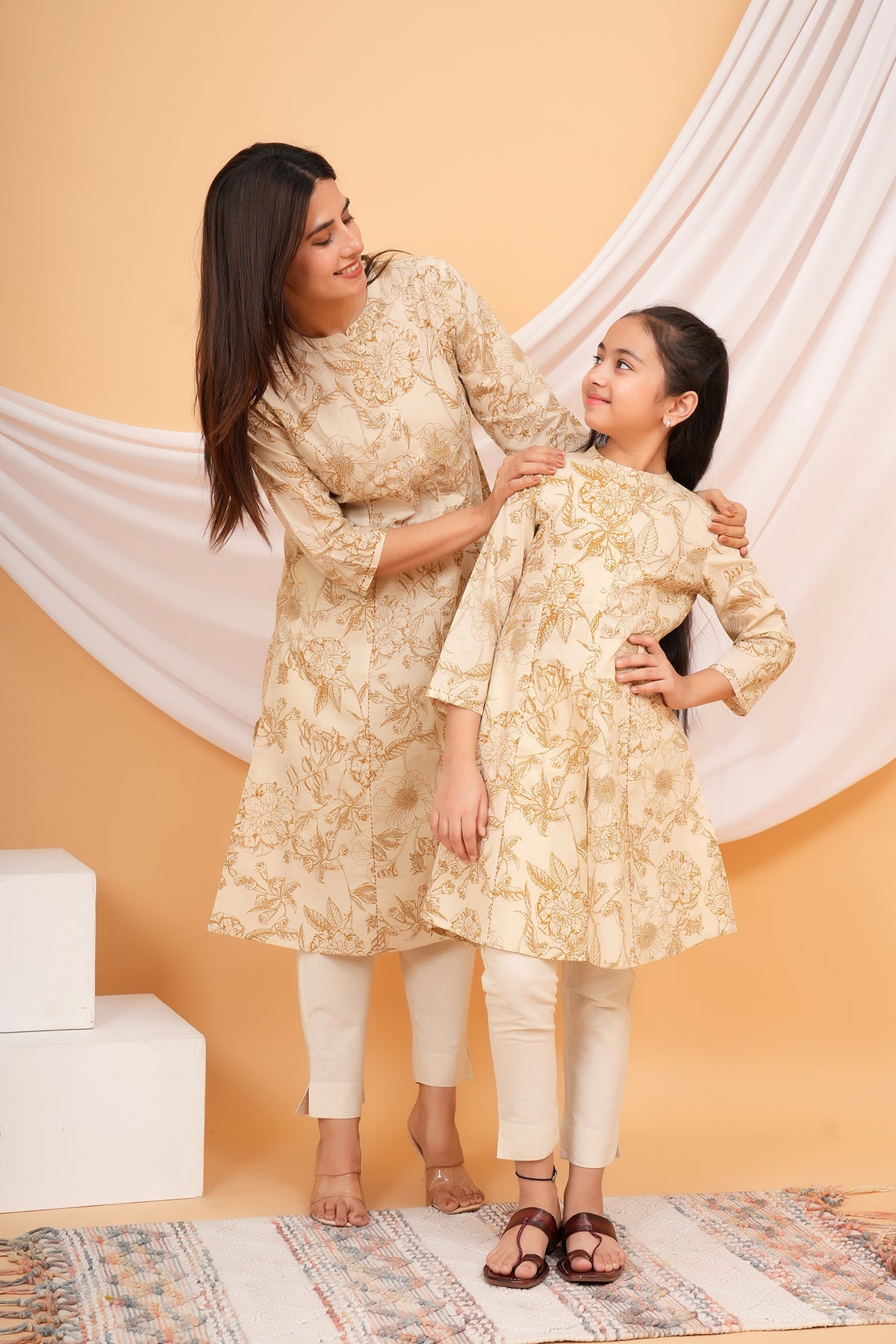 Delicated Floral Printed Soft Ivory Based Cotton Kurti For Mother