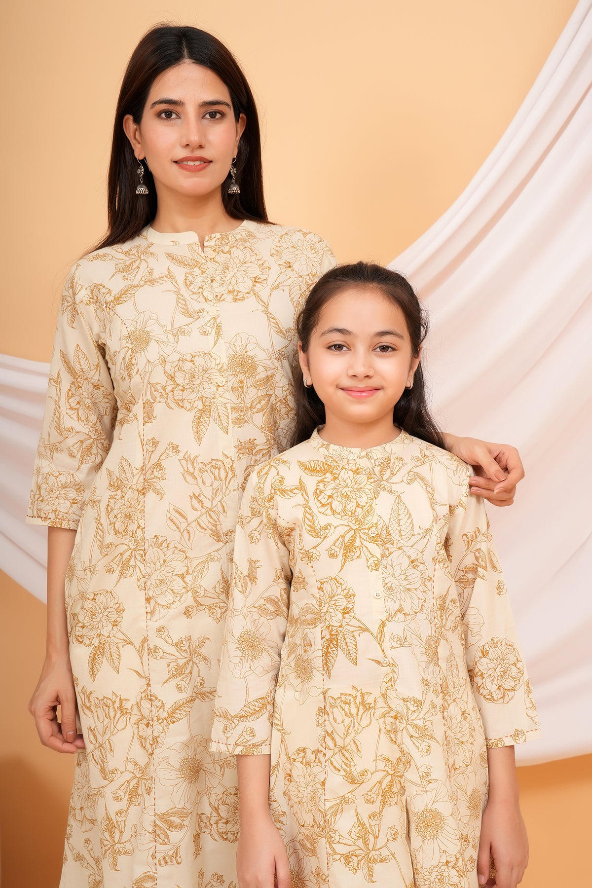 Delicated Floral Printed Soft Ivory Based Cotton Kurti For Mother