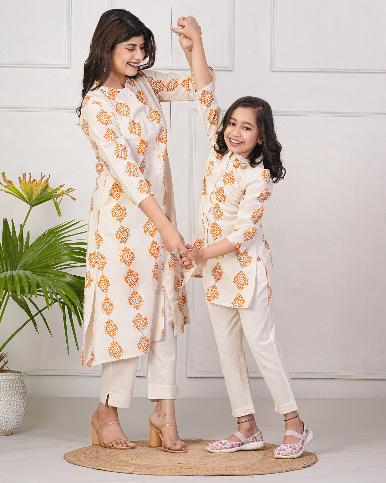 Off-White With Orange Block Printed Cotton Kurti