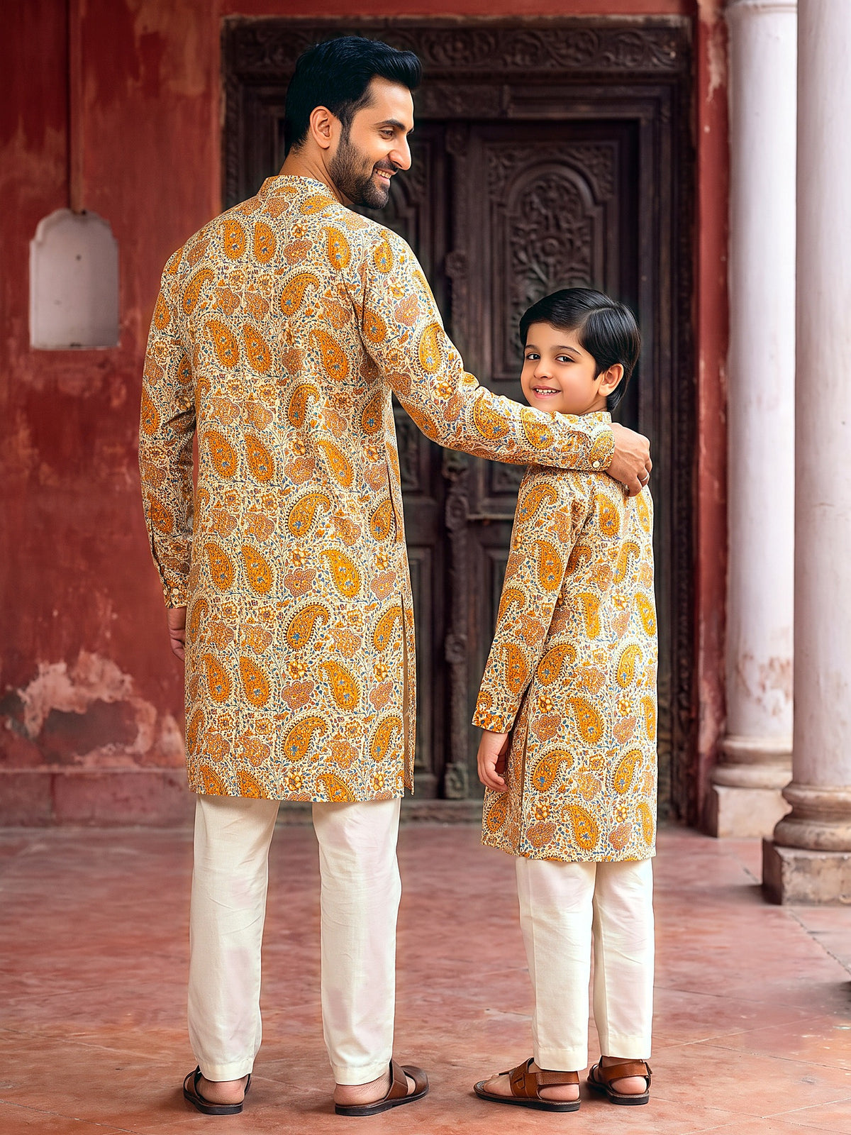 Baap Beta Collection by Gatim mustard yellow paisley father son kurta set, back view