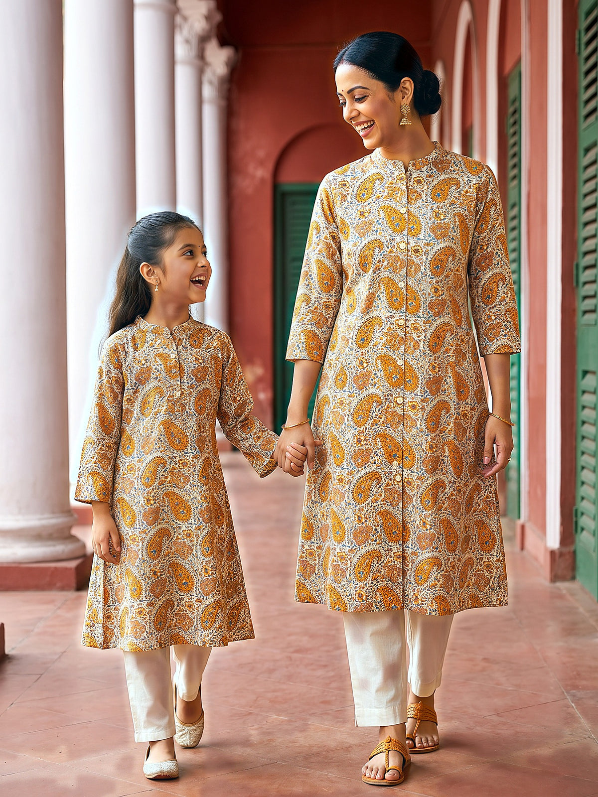 Maa Beti Collection by Gatim mustard yellow paisley mother daughter kurti set, candid