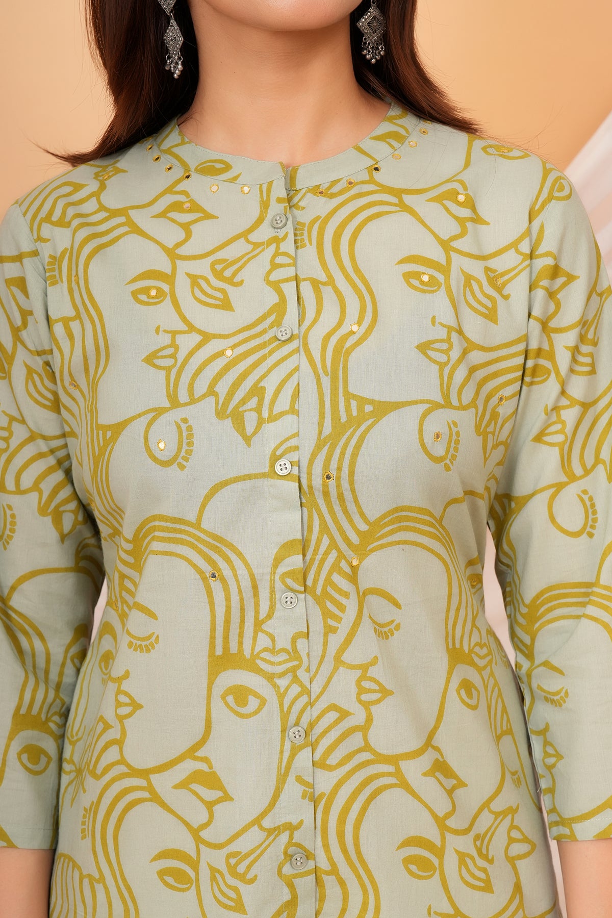 White Solid Base with Abstract Face Art Printed Kurti for Beta - Sage Green