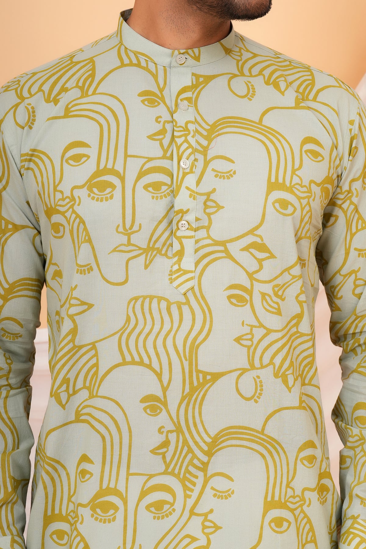 White Solid Base with Abstract Face Art Printed Kurti for Beti - Sage Green