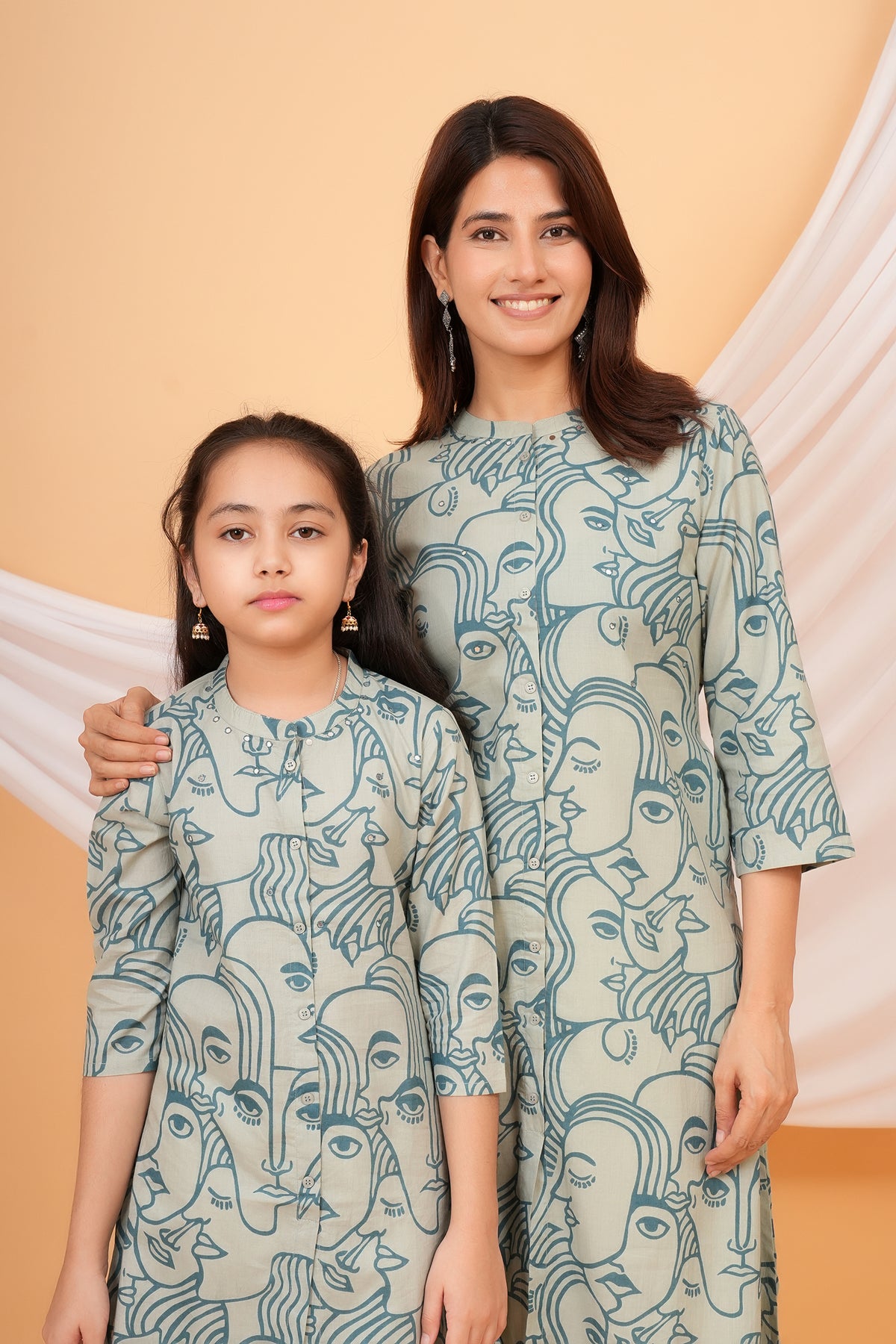 White Solid Base with Abstract Face Art Printed Kurti for Beta - Sky Blue