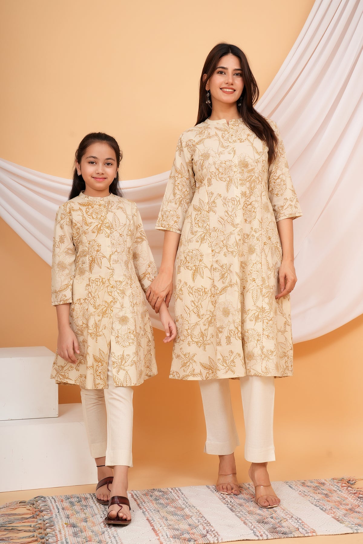 Delicated Floral Printed Soft Ivory Based Cotton Kurti For Mother