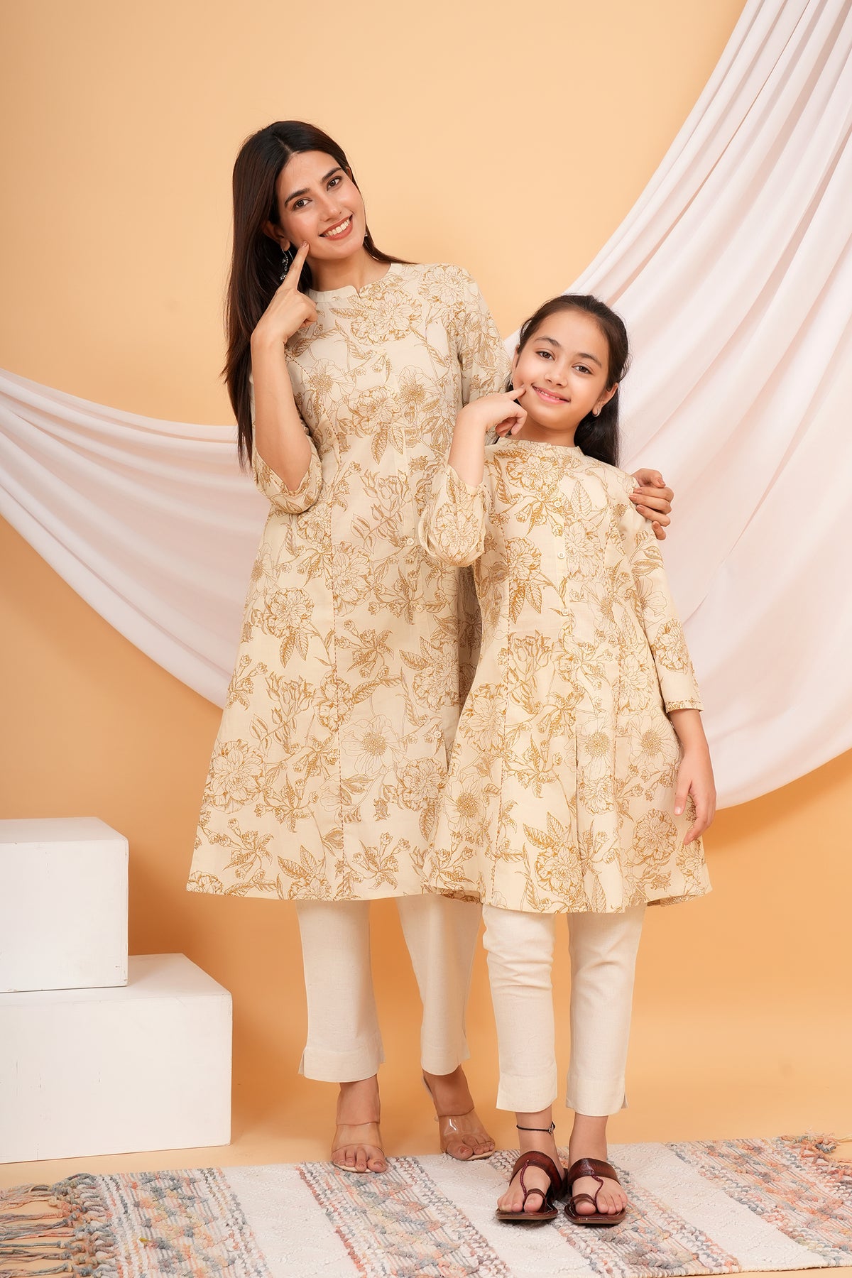 Delicated Floral Printed Soft Ivory Based Cotton Kurti For Mother