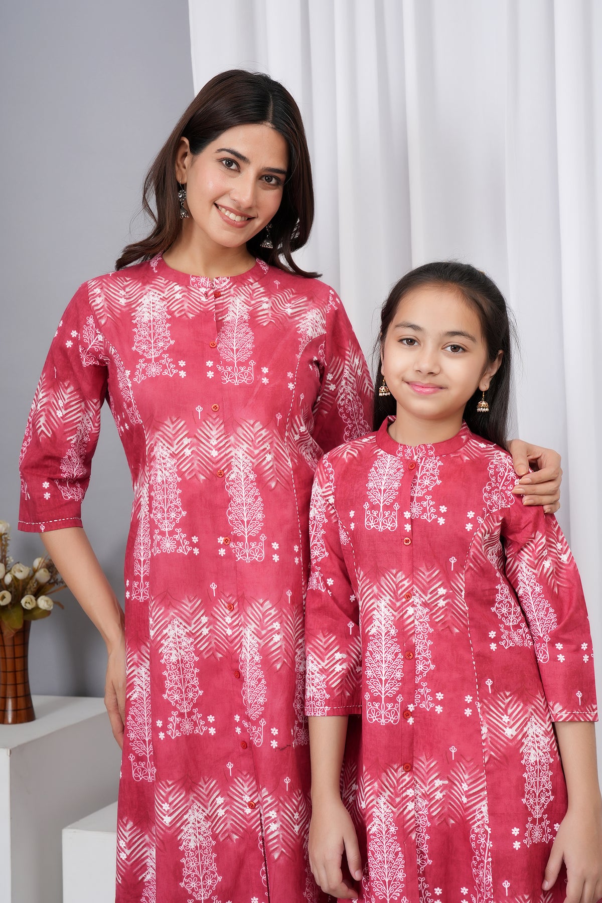 Elegant Floral And Leafy Pattern Rich Berry Pink Kurti For Beti