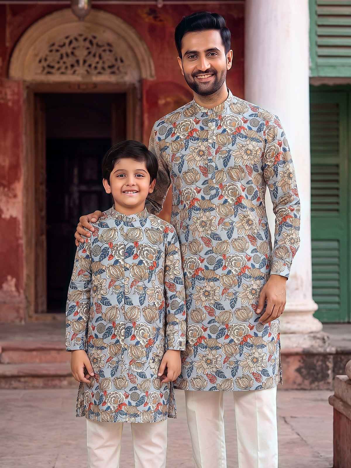 Father and son in matching grey floral printed kurtas