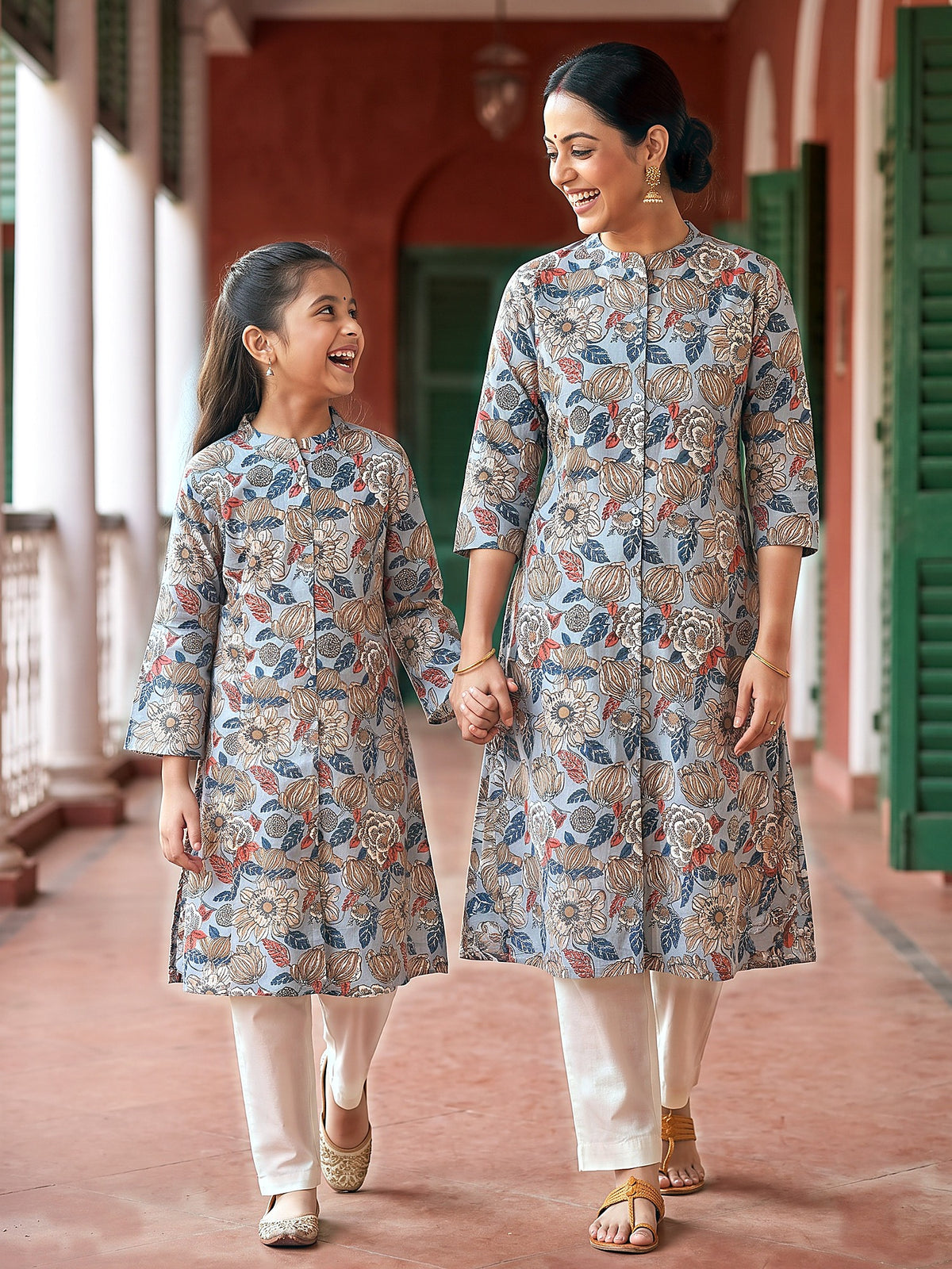 Maa Beti grey floral kurtis walking hand in hand
