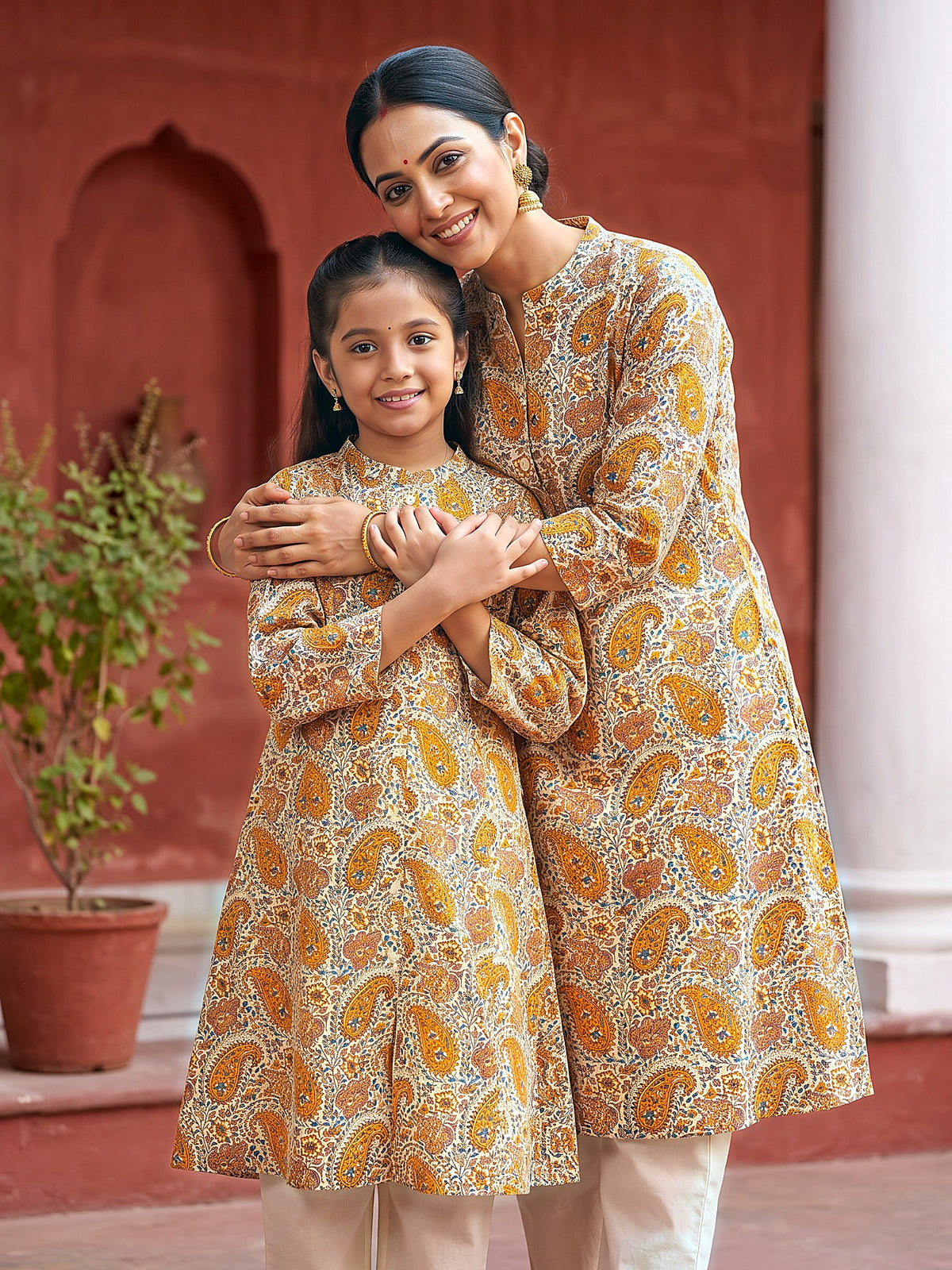 Maa Beti Collection by Gatim mustard yellow paisley mother daughter kurti set, together