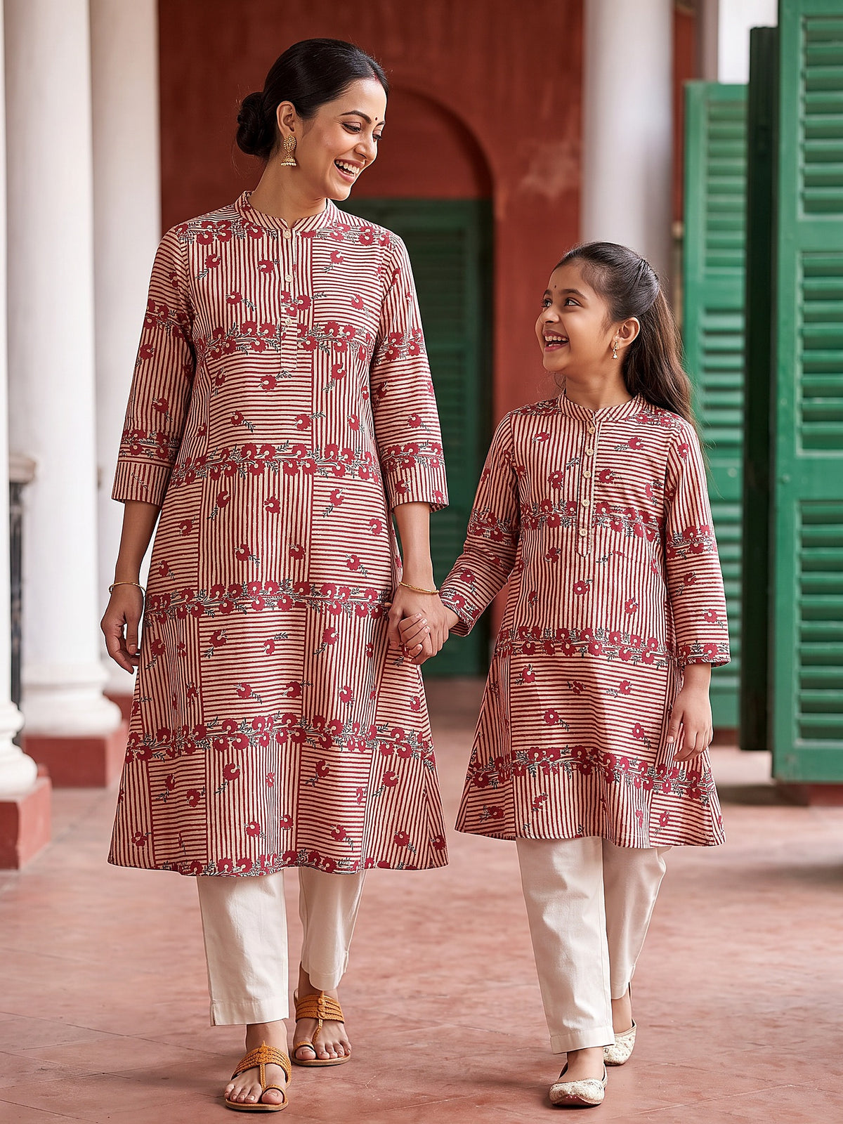 Maa Beti red stripe kurtis walking hand in hand