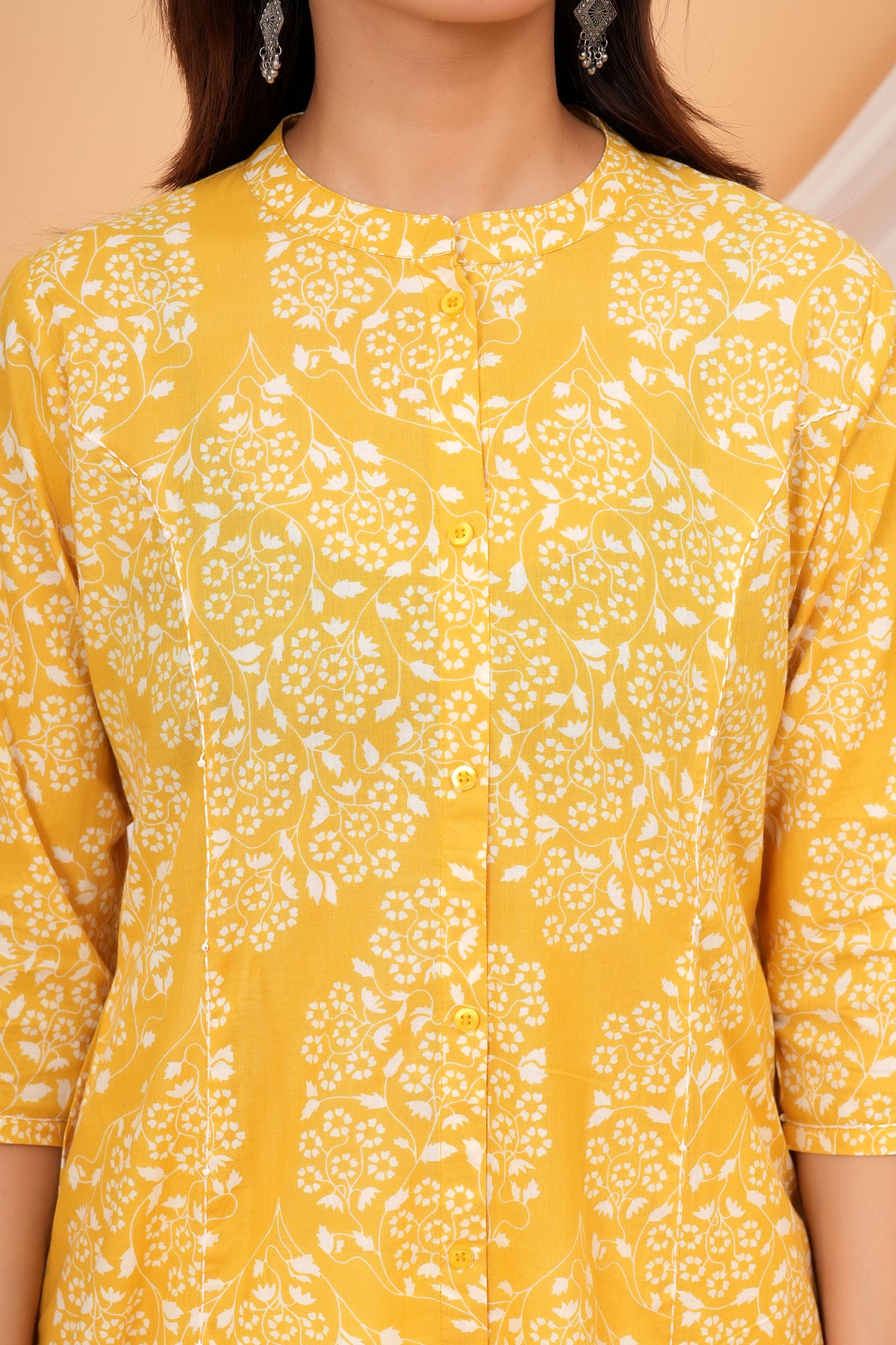 Maa and Beti in matching yellow floral jaal printed kurtis